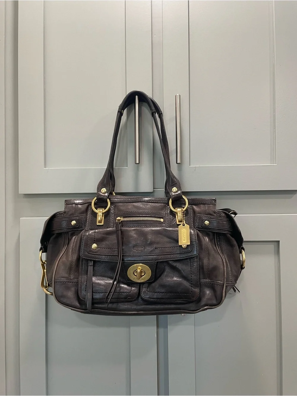 Coach Black Leather Handbag with Purple Lining